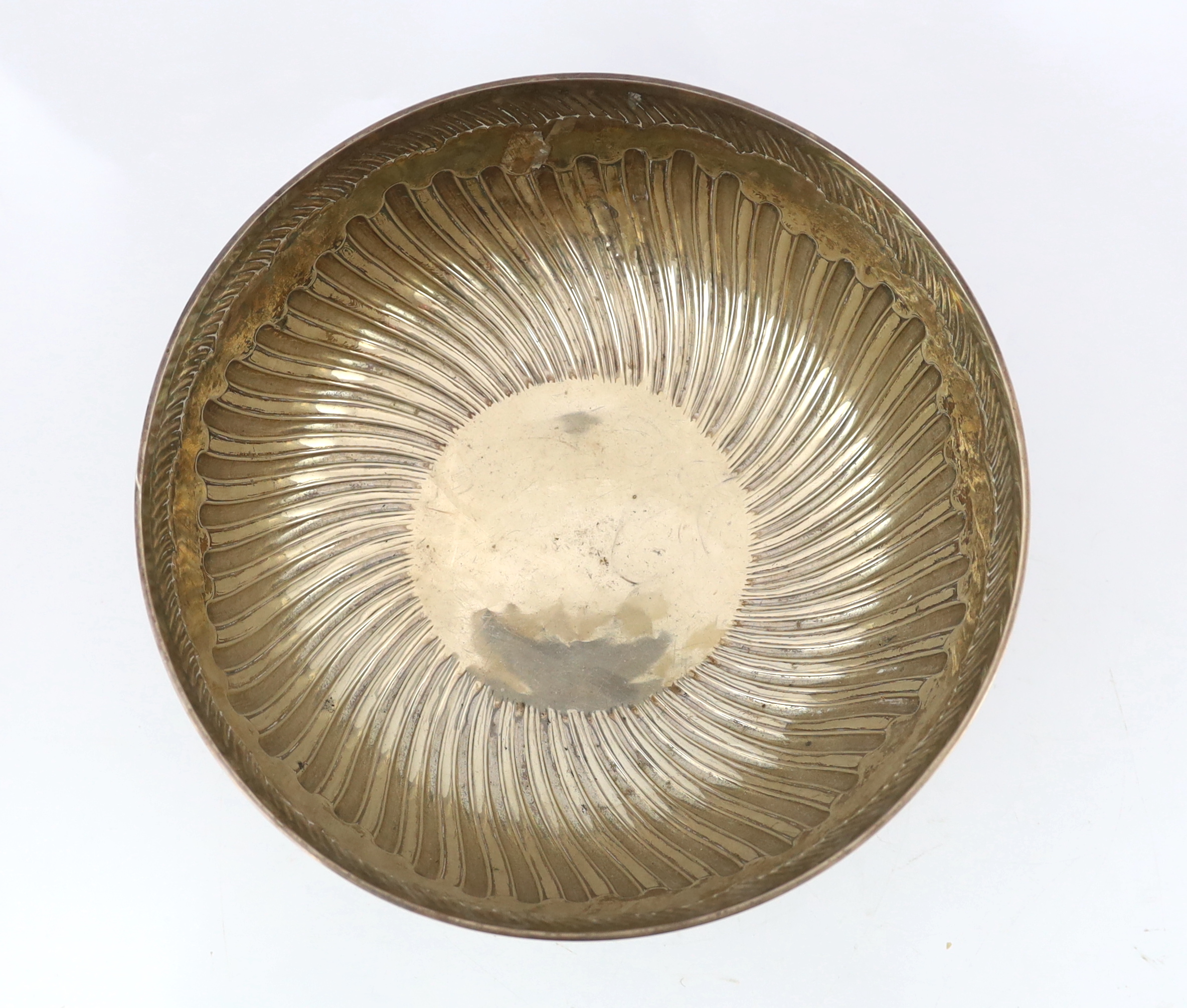 A late Victorian demi fluted silver circular punch bowl, by Goldsmiths & Silversmiths Co. Ltd., diameter 32cm, 42.6oz.